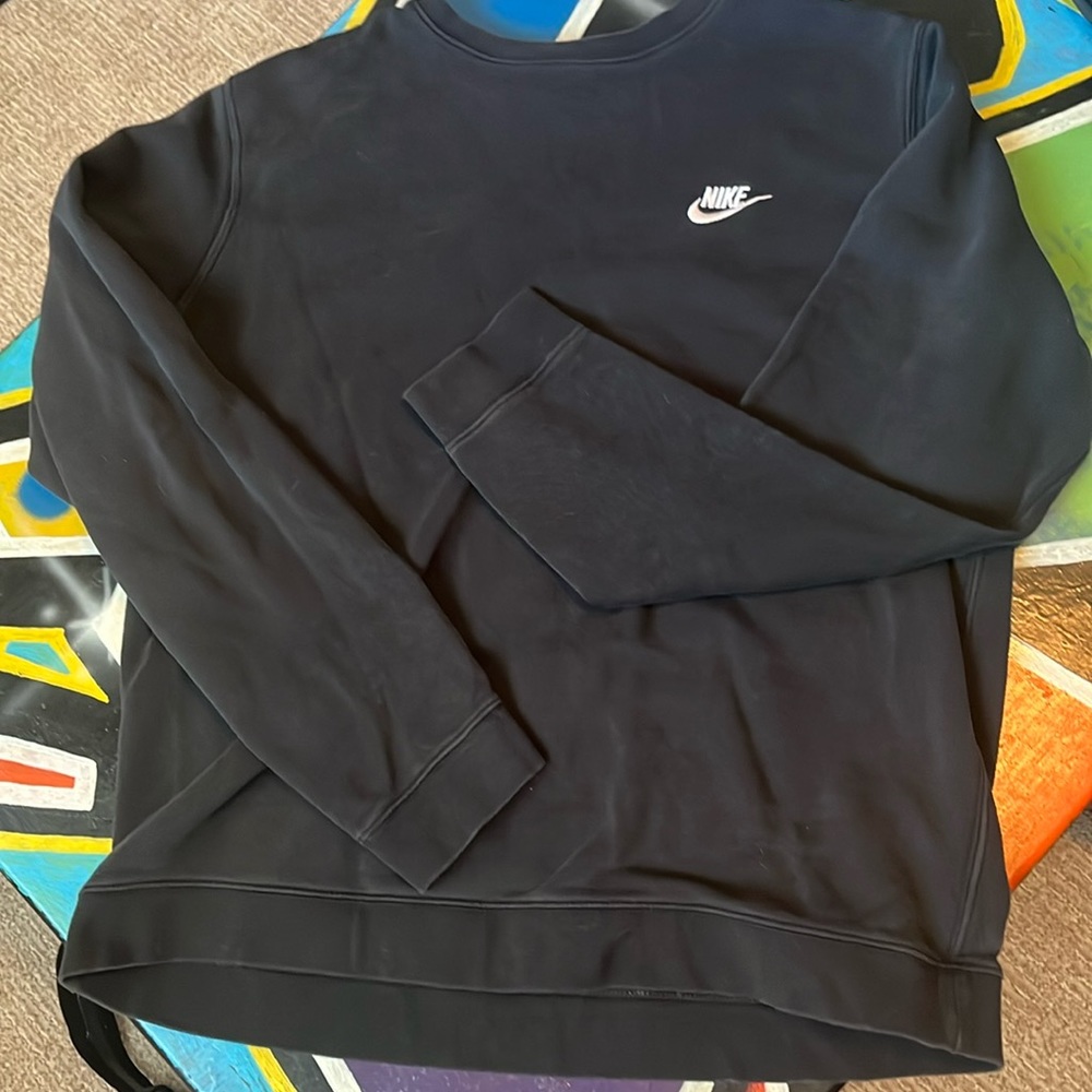 Nike unisex, black sweater, size large- minor wear on sleeves.